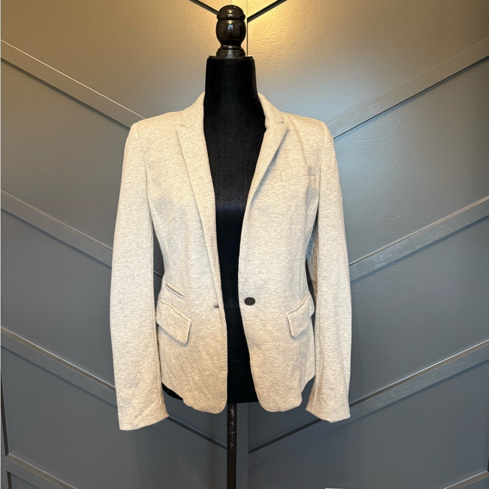 LOFT Cream Blazer and it runs small. I would say more like a size 6.